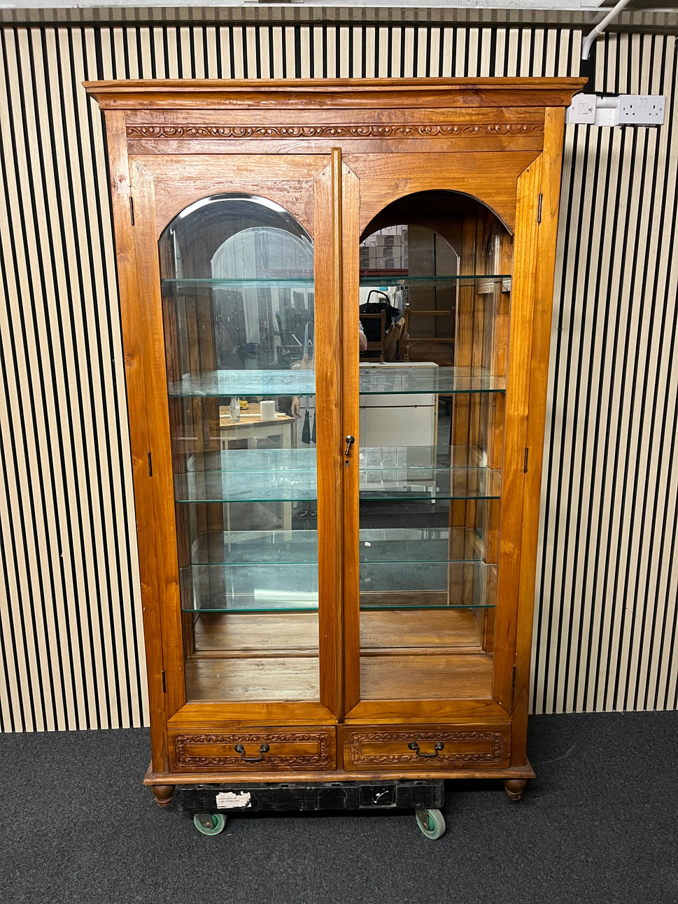 Solid dark wood carved details large 2 glass door 2 drawer display unit, glass missing from 1 door (H 200 x W 122 x D 45 cm) 1325