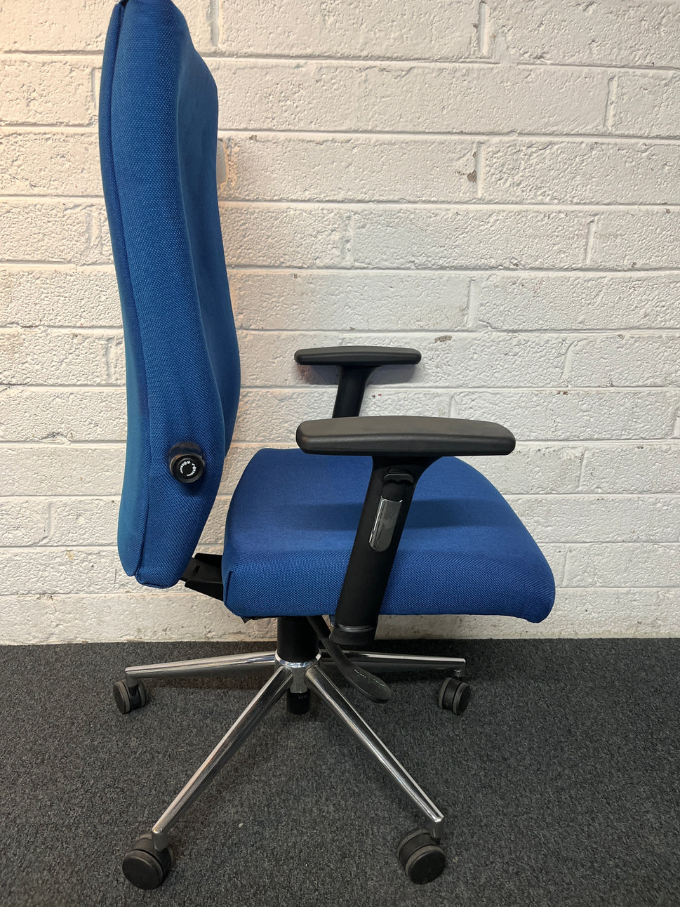 Secondhand High back, dark blue fabric swivel chair, heavy duty with polished chrome base and height adjustable arms and back tensioner . PRICE INC VAT, 20+ IN STOCK