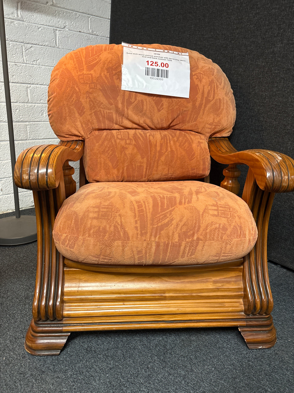 Solid dark wood stained armchair with terracotta fabric seat and back cushion 1225