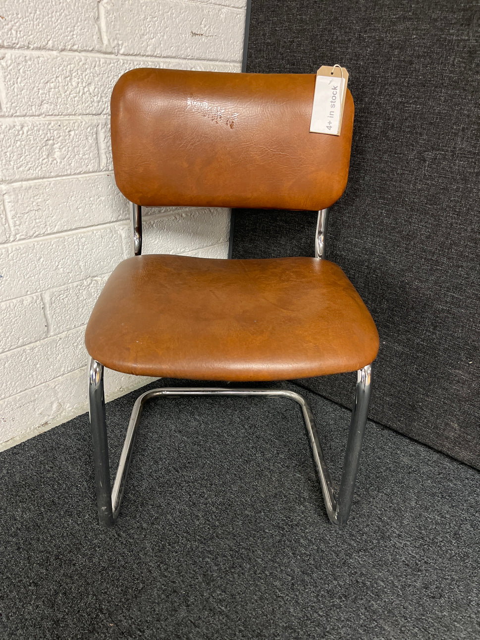 SECONDHAND BROWN leatherette cantilever meeting chair