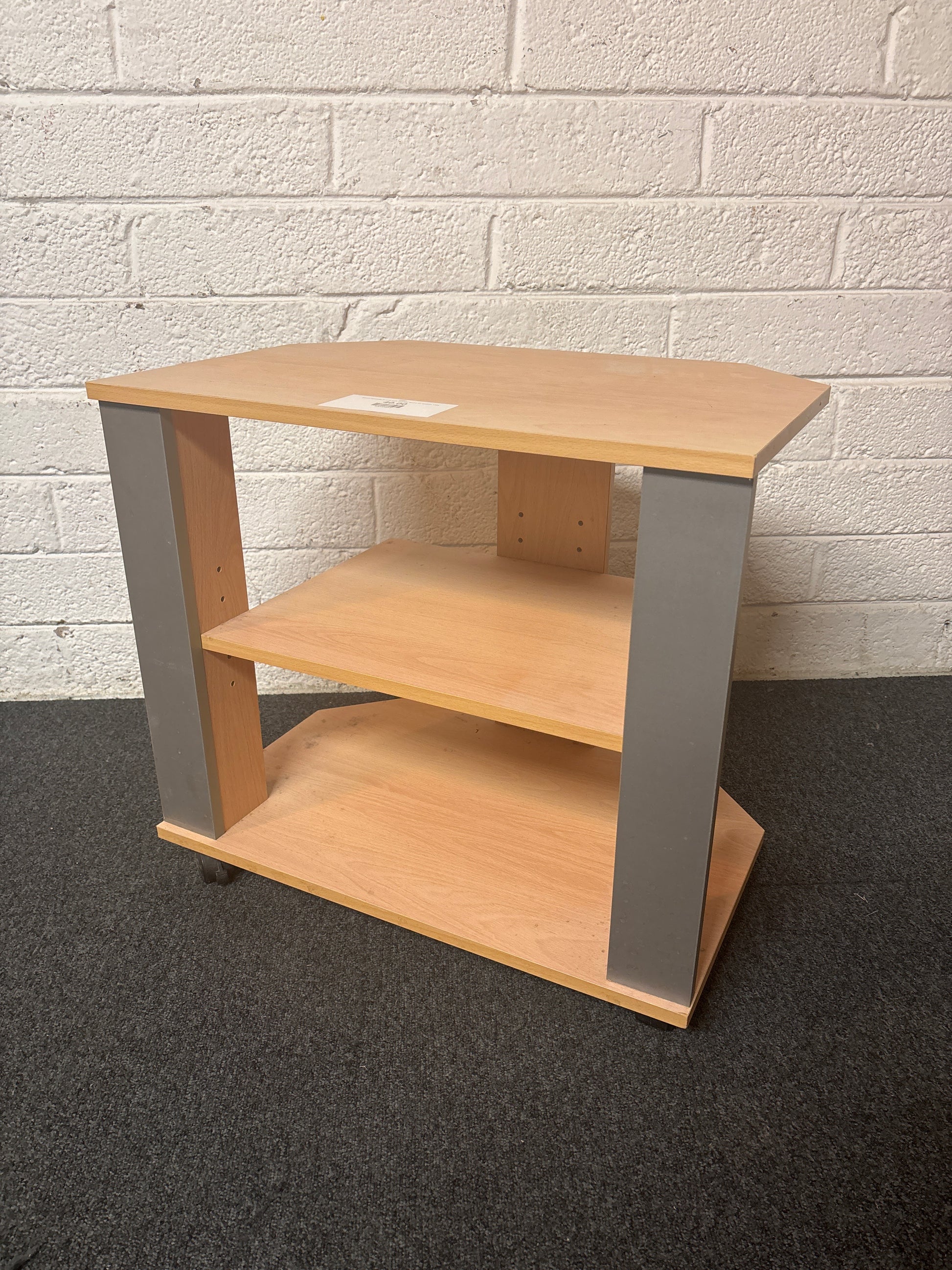 Beech laminate tv unit with storage space on castors 1325