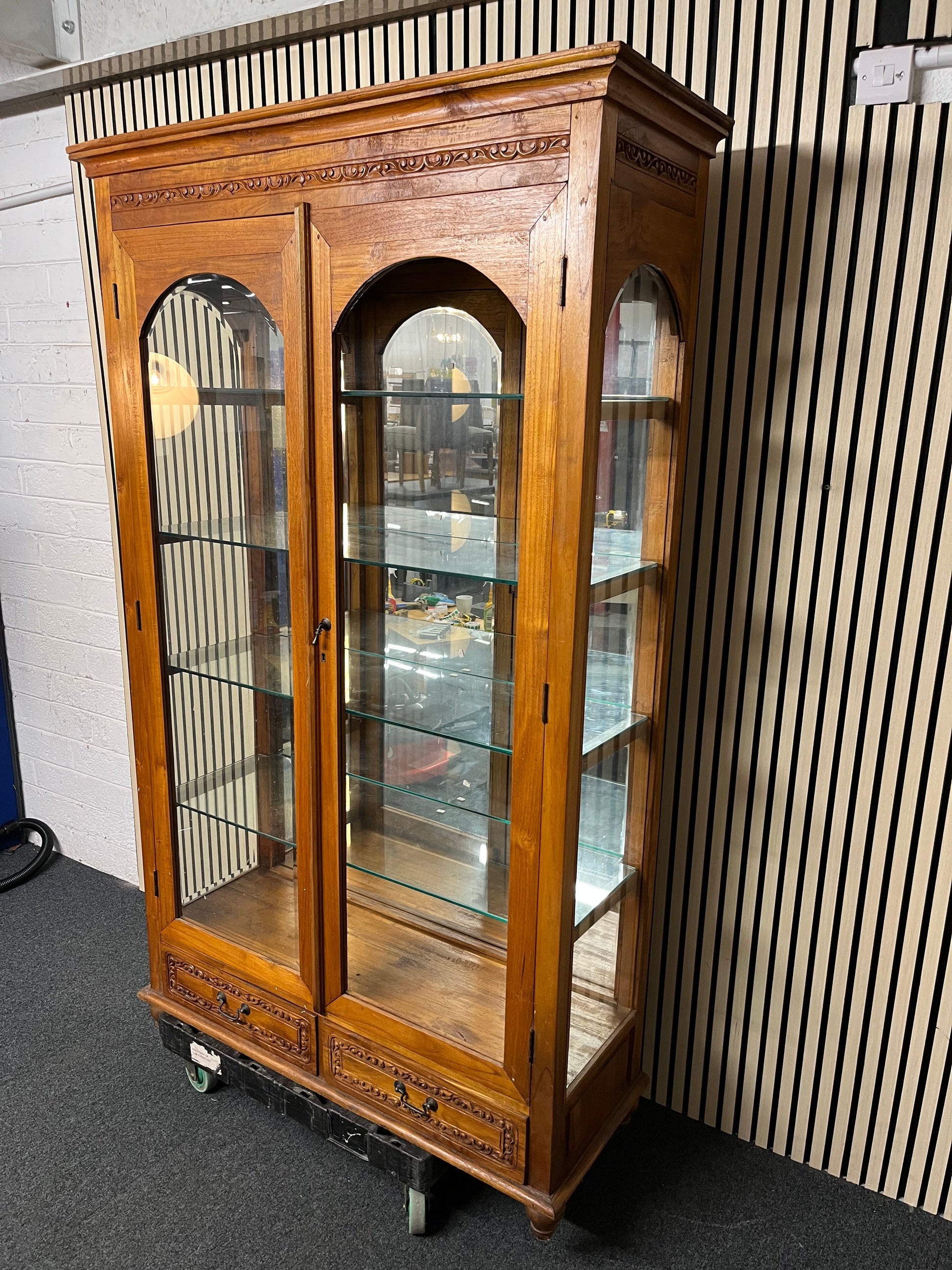 Solid dark wood carved details large 2 glass door 2 drawer display unit, glass missing from 1 door (H 200 x W 122 x D 45 cm) 1325