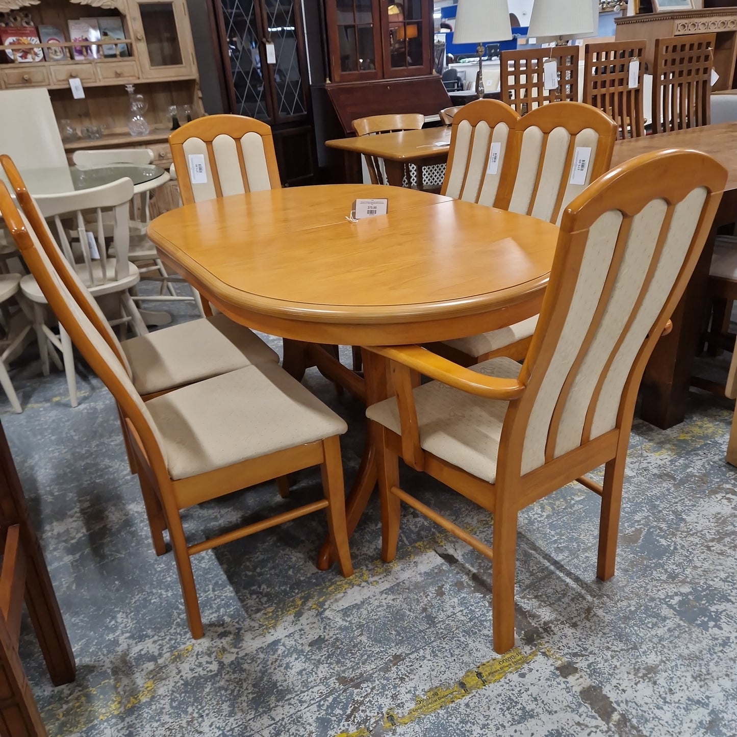 Oval beech extenable dining table complete with 4 no. chairs and 2 no. carvers with cream fabric seat and back  3124