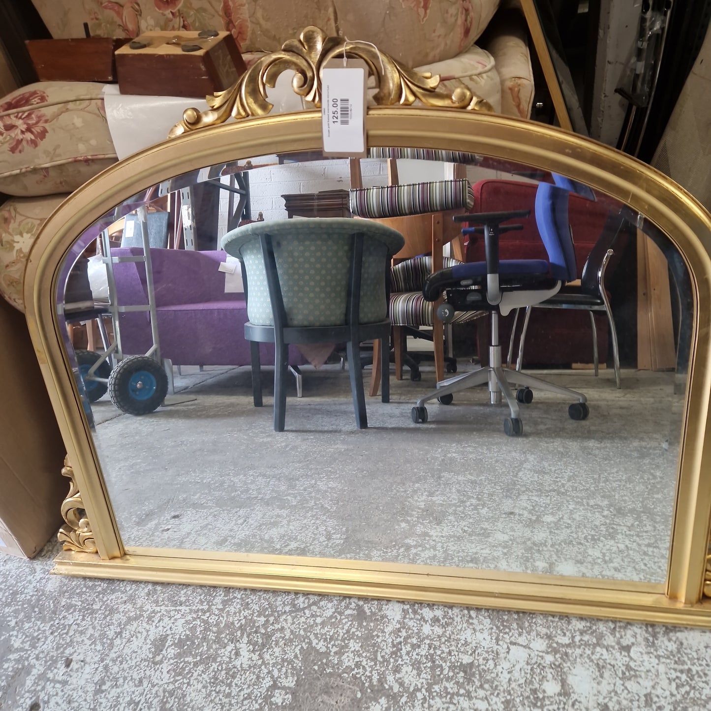 Ornate gold framed overmantle mirror