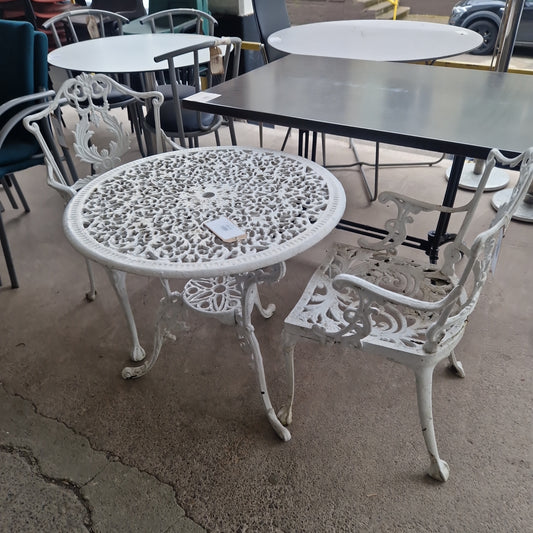 Cast iron outdoor table with 2 no. chairs