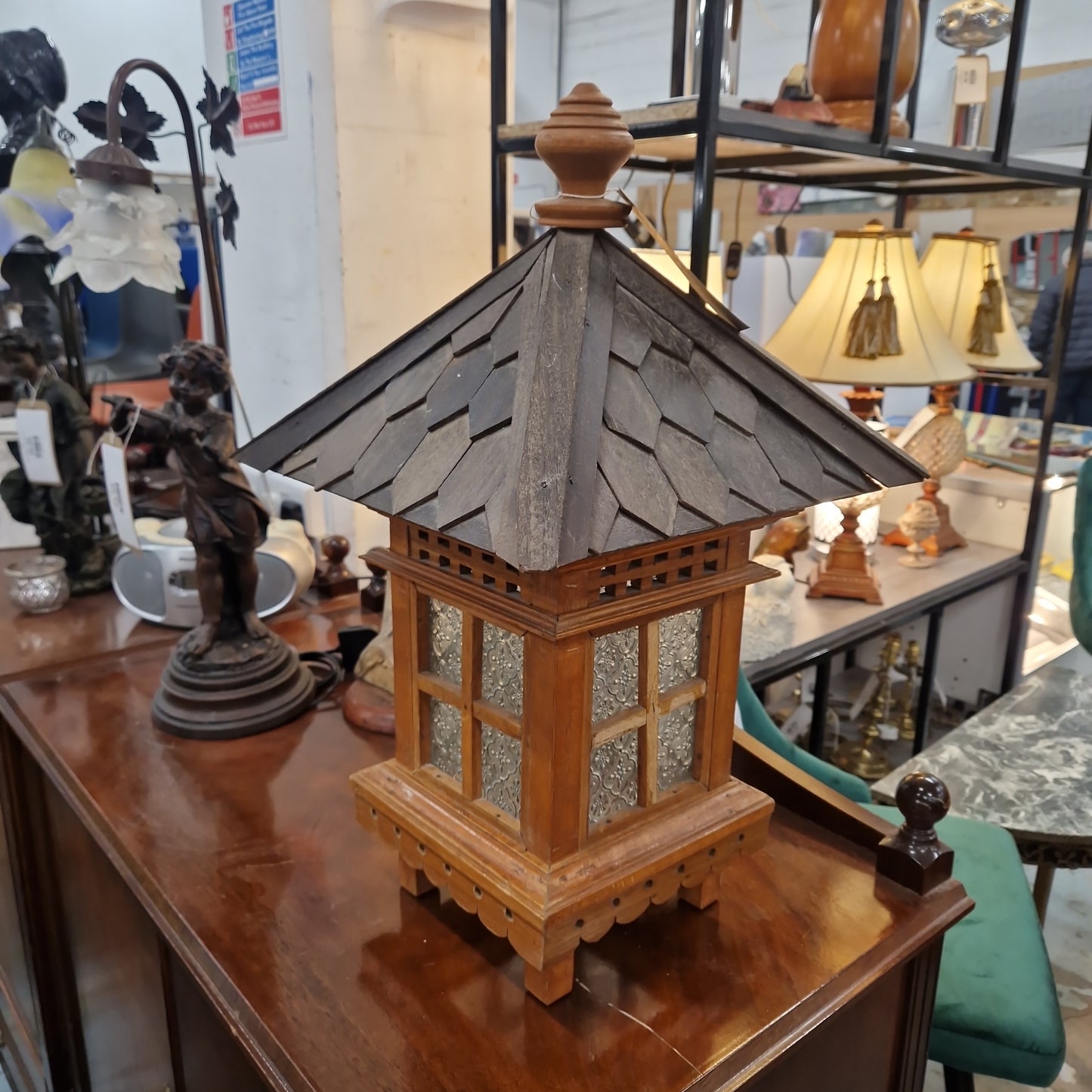 Ornate wooden framed lantern