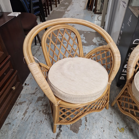 Cane amrchair with cream seat fabric