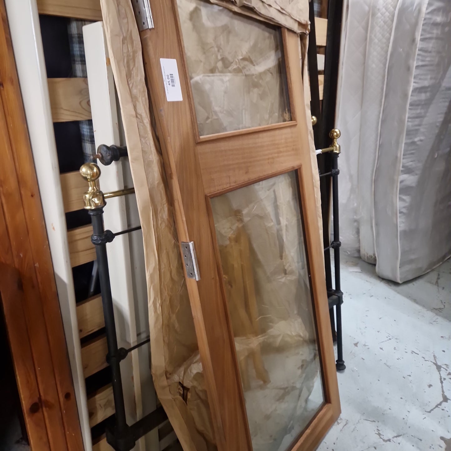 Tall solid teak internal door with glass panels