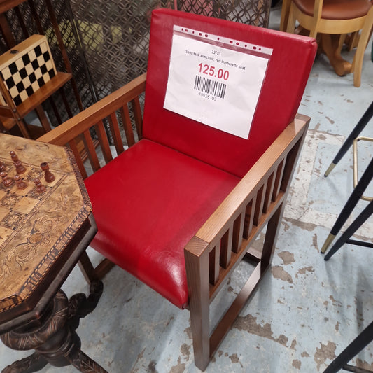 Solid teak armchair, red leatherette seat