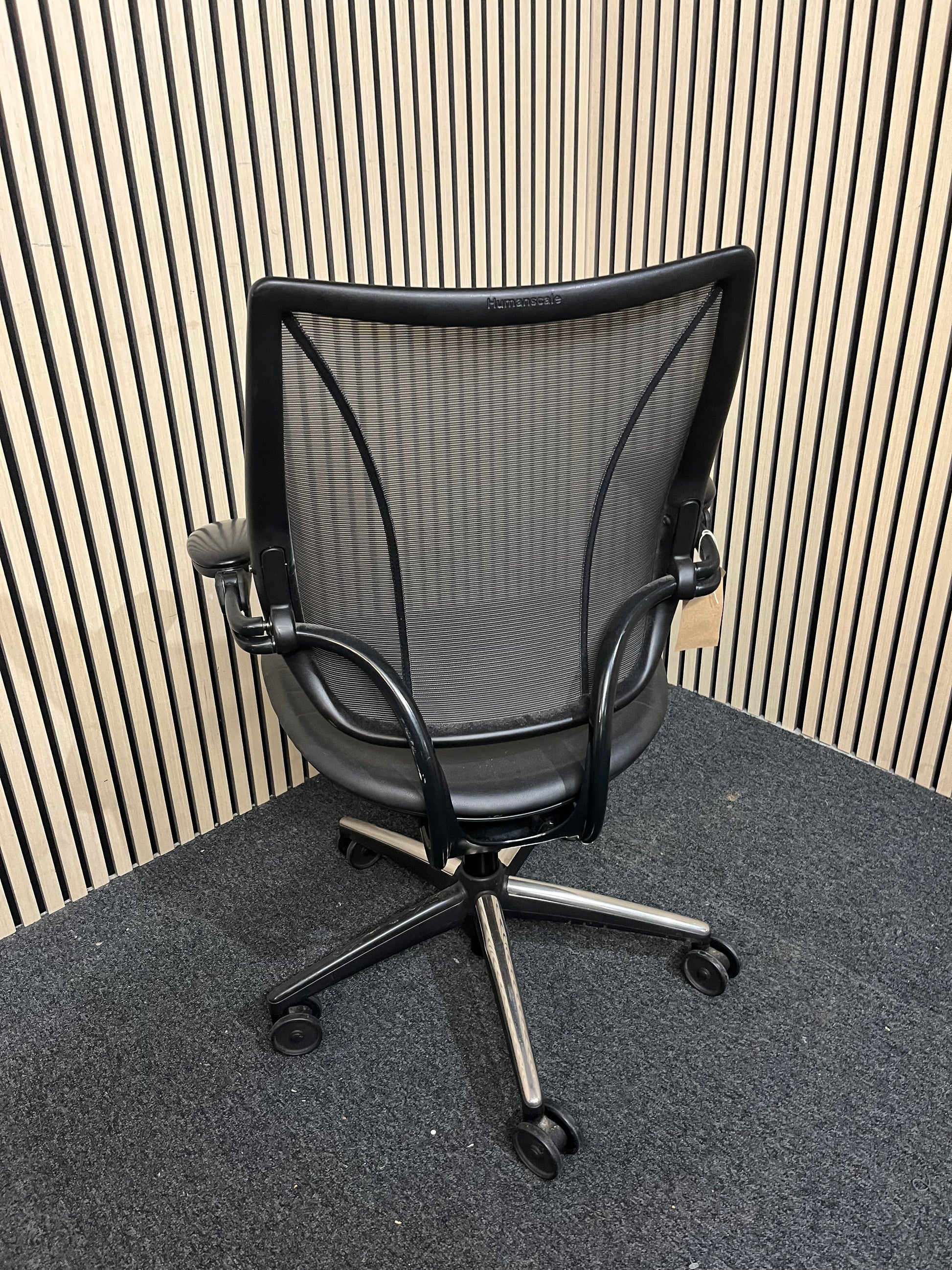 Humanscale Liberty swivel chair, mesh back with adjustable arms and black leather seat