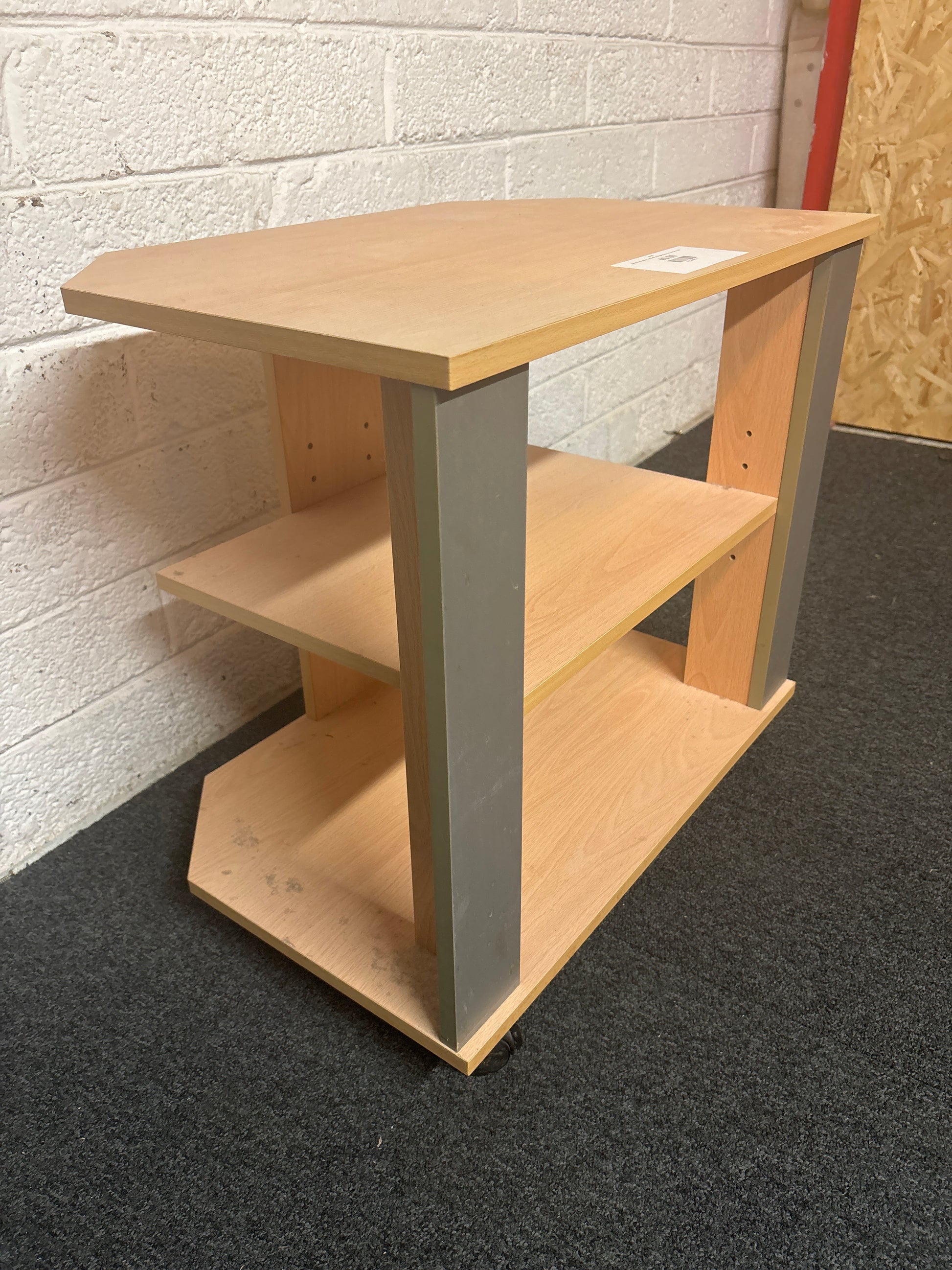 Beech laminate tv unit with storage space on castors 1325