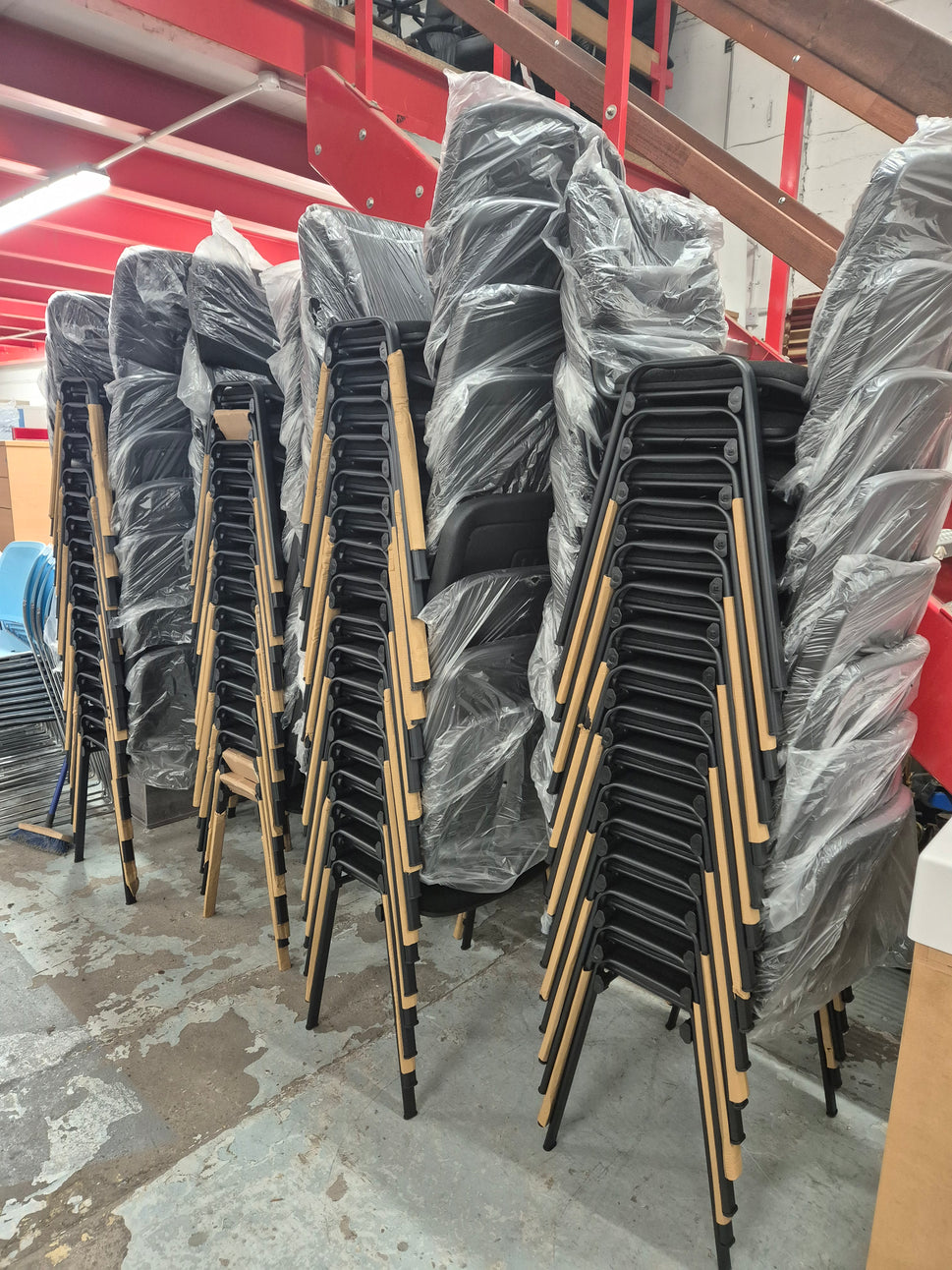 BRAND NEW Black frame taurus stackable chair