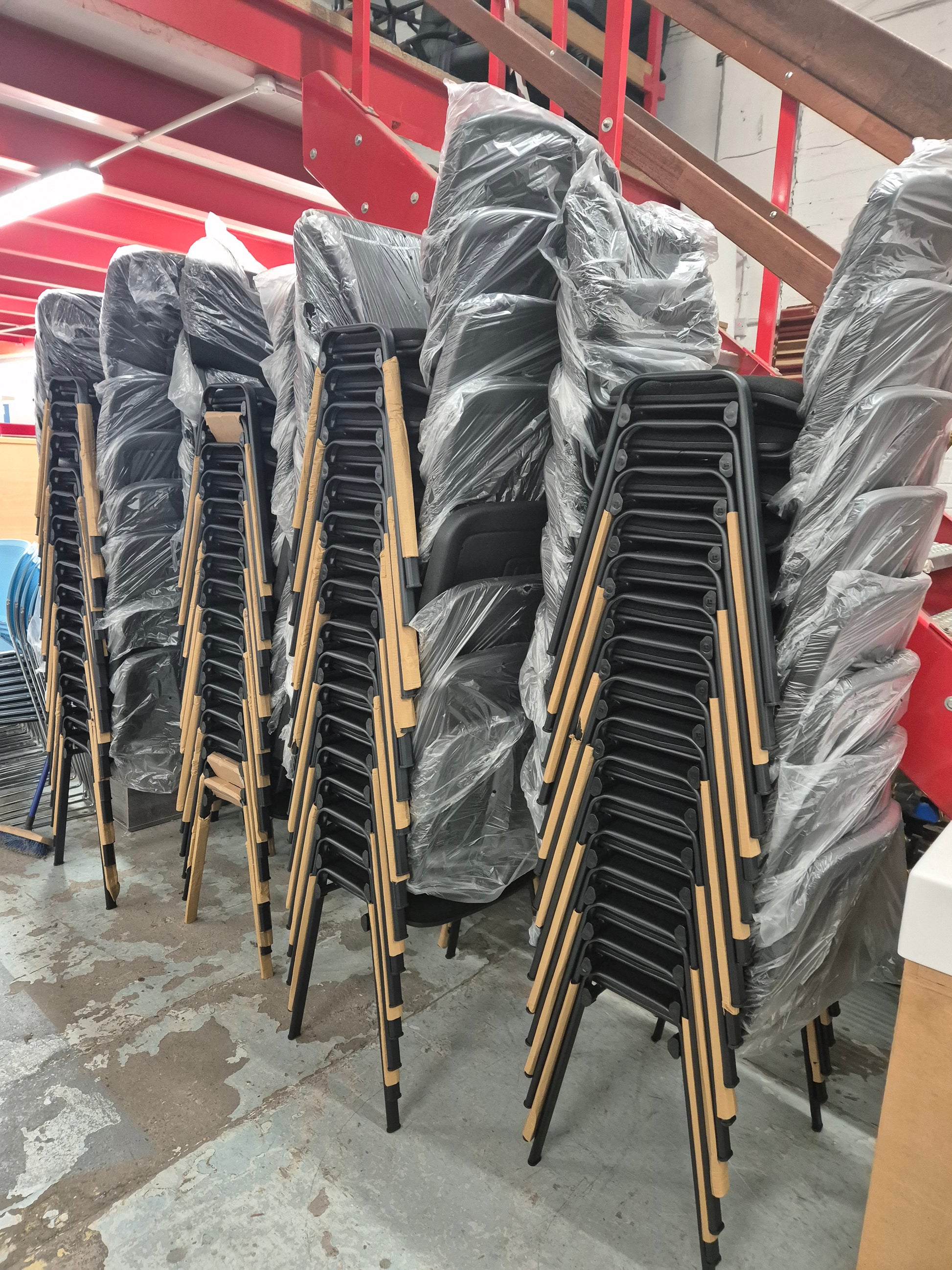 BRAND NEW Black frame taurus stackable chair