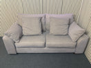 Grey two seater fabric sofa with matching plaid cushions. 44593