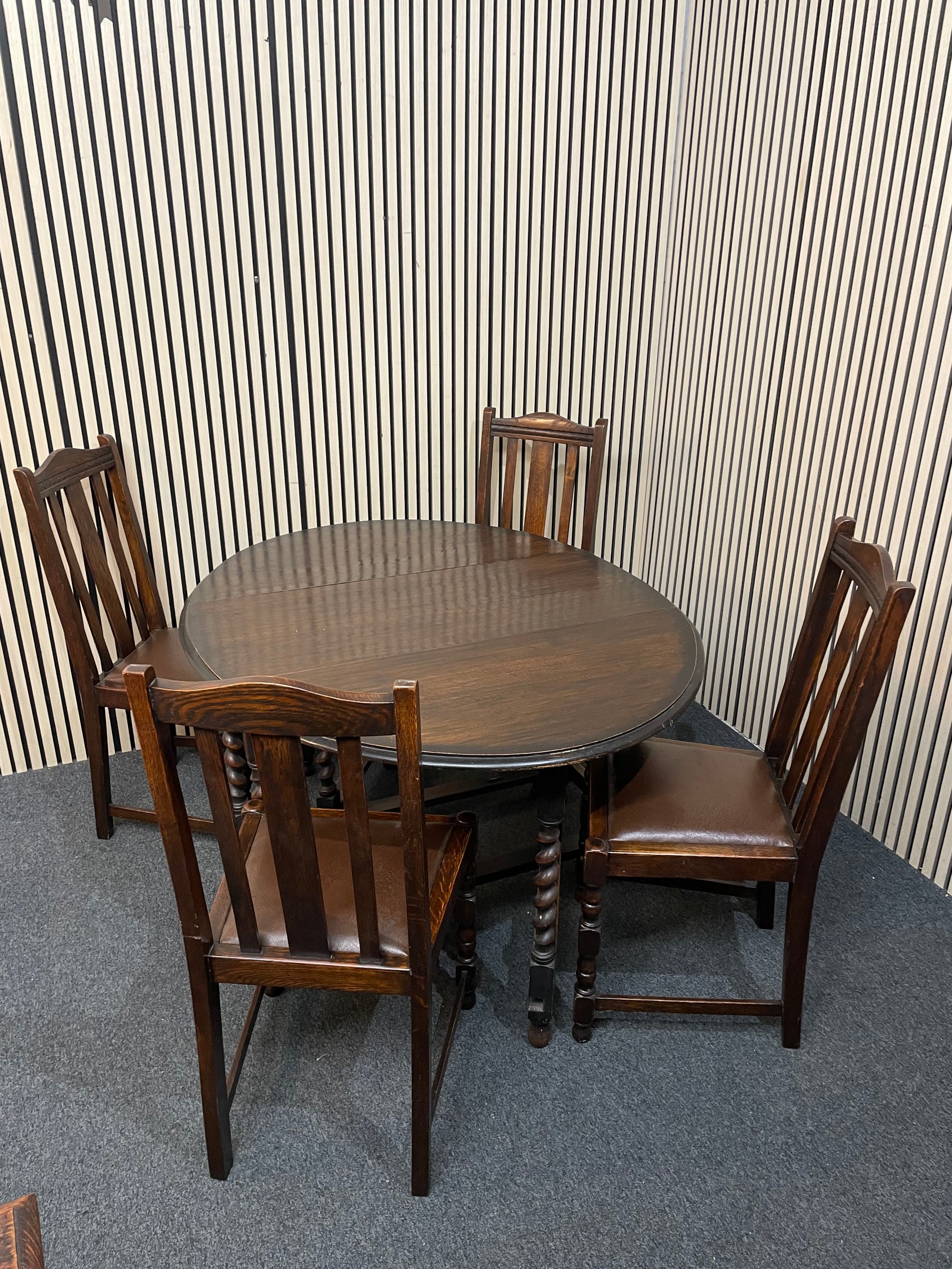 Drop leaf dark oak stained oval dining table, barley twist legs (W 109 x L 135 cm) with 4 no. matching chairs 3126