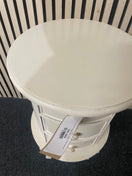 Oval three-drawer bedside locker with cabriole legs and cream finish. 44701