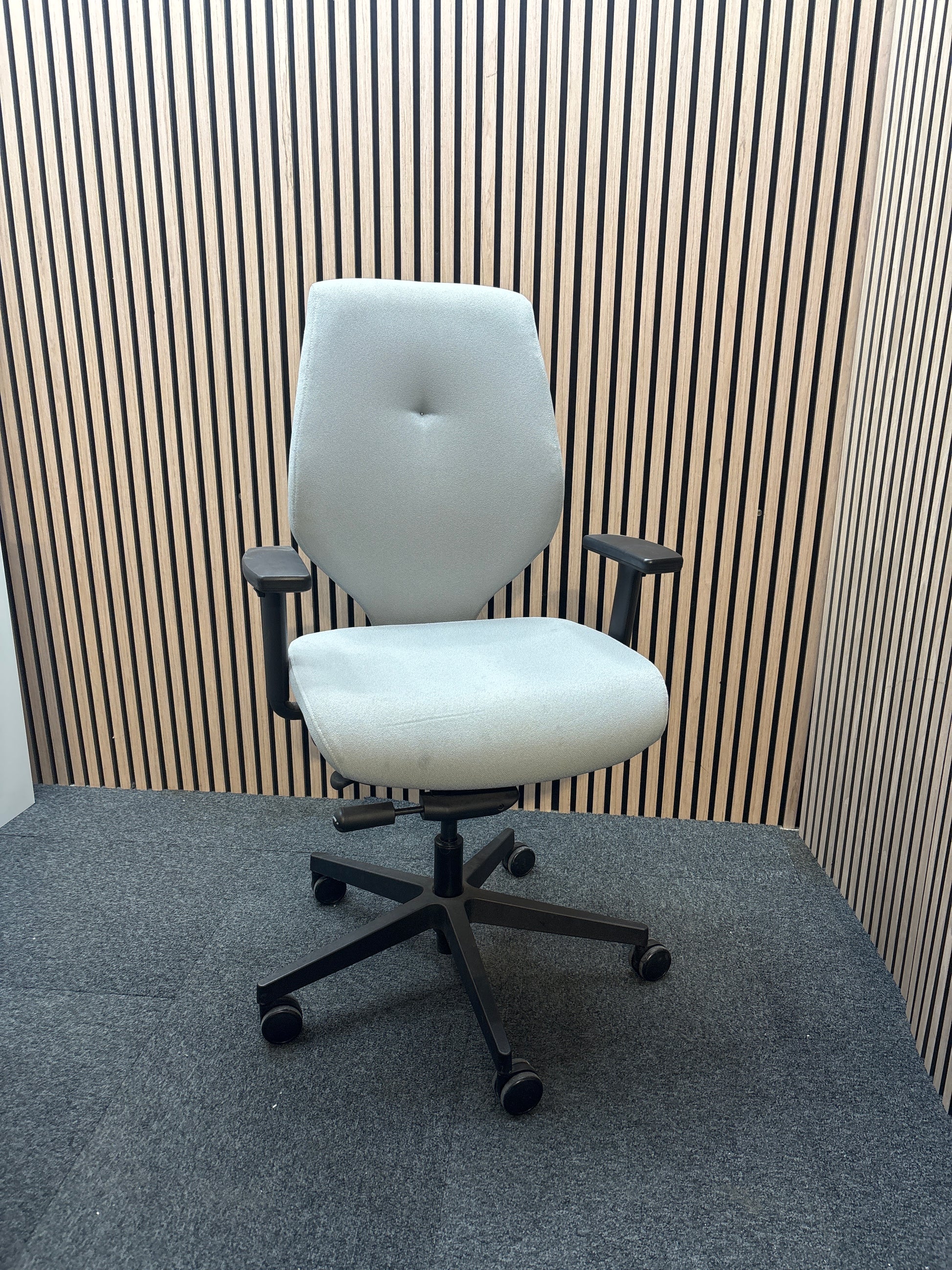 Grey secondhand fabric swivel chair with adjustable arms and 5 star swivel base