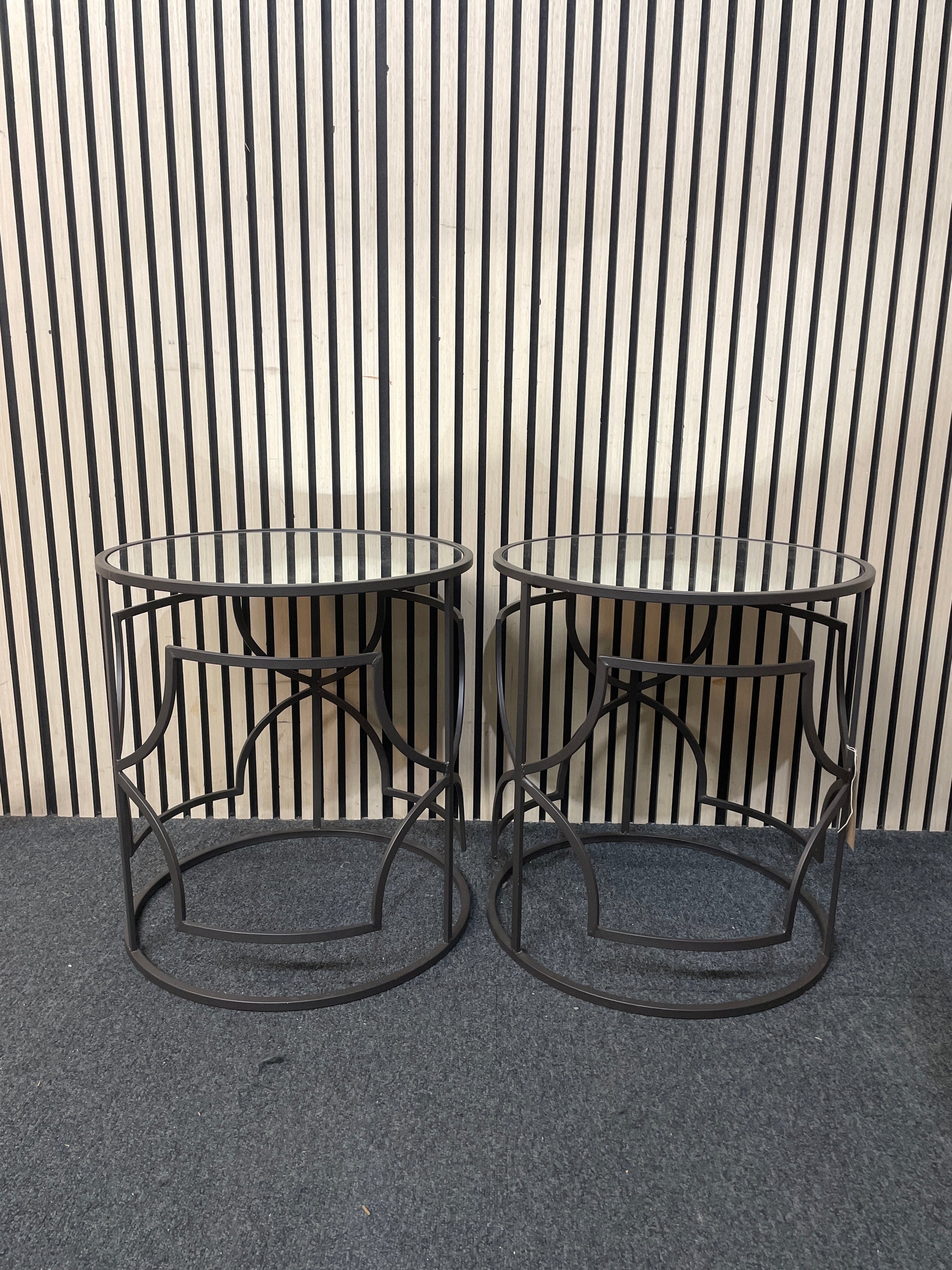 Pair of black metal and glass circular occasional tables 2226