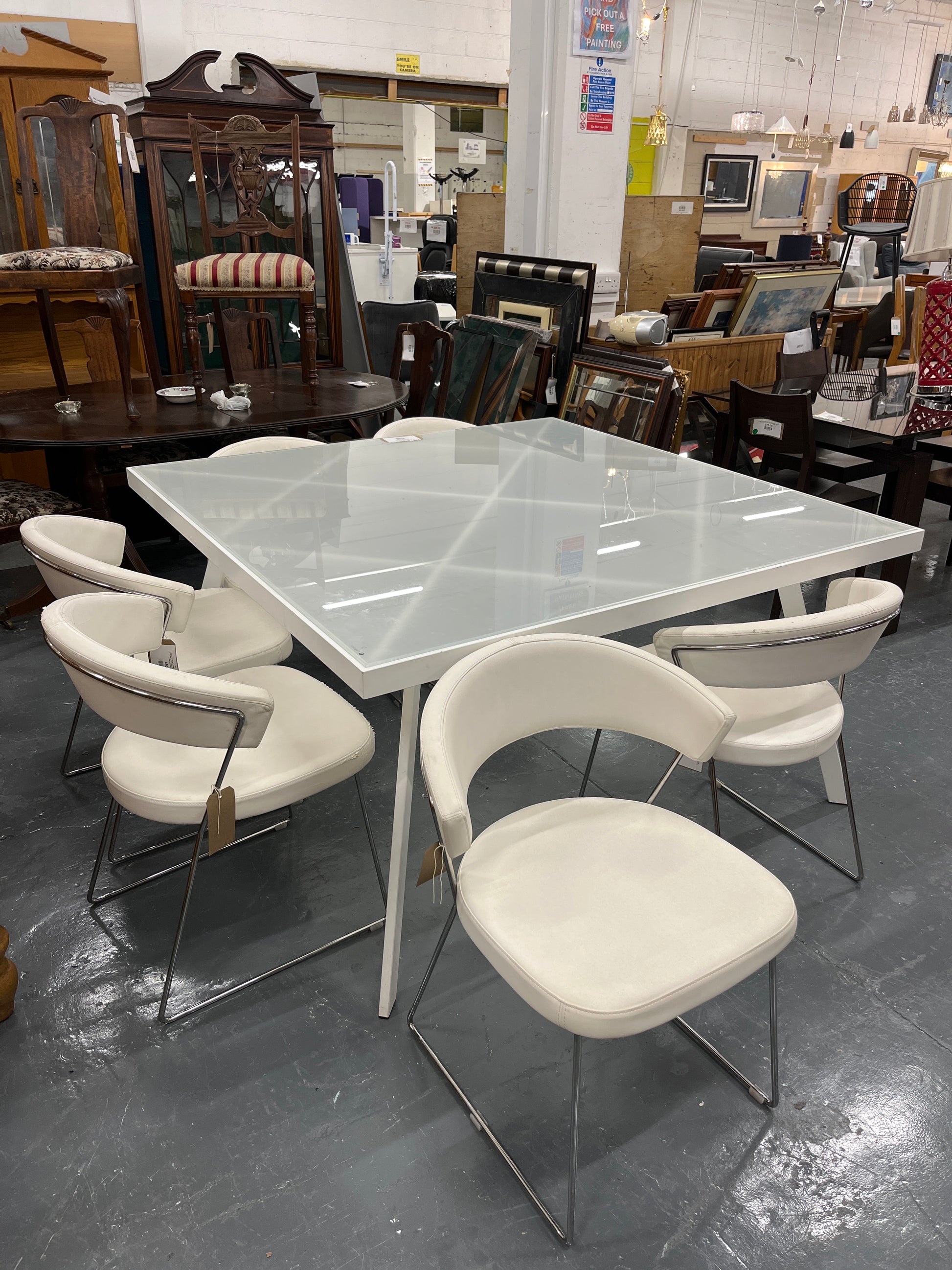 Calligaris Large white powder coated framed frosted glass table (W 140 x L 140 cm) with 6 no chrome framed, white leatherette club chairs 3225