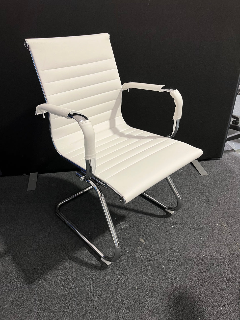 Cream leather chrome framed cantilever meeting chair