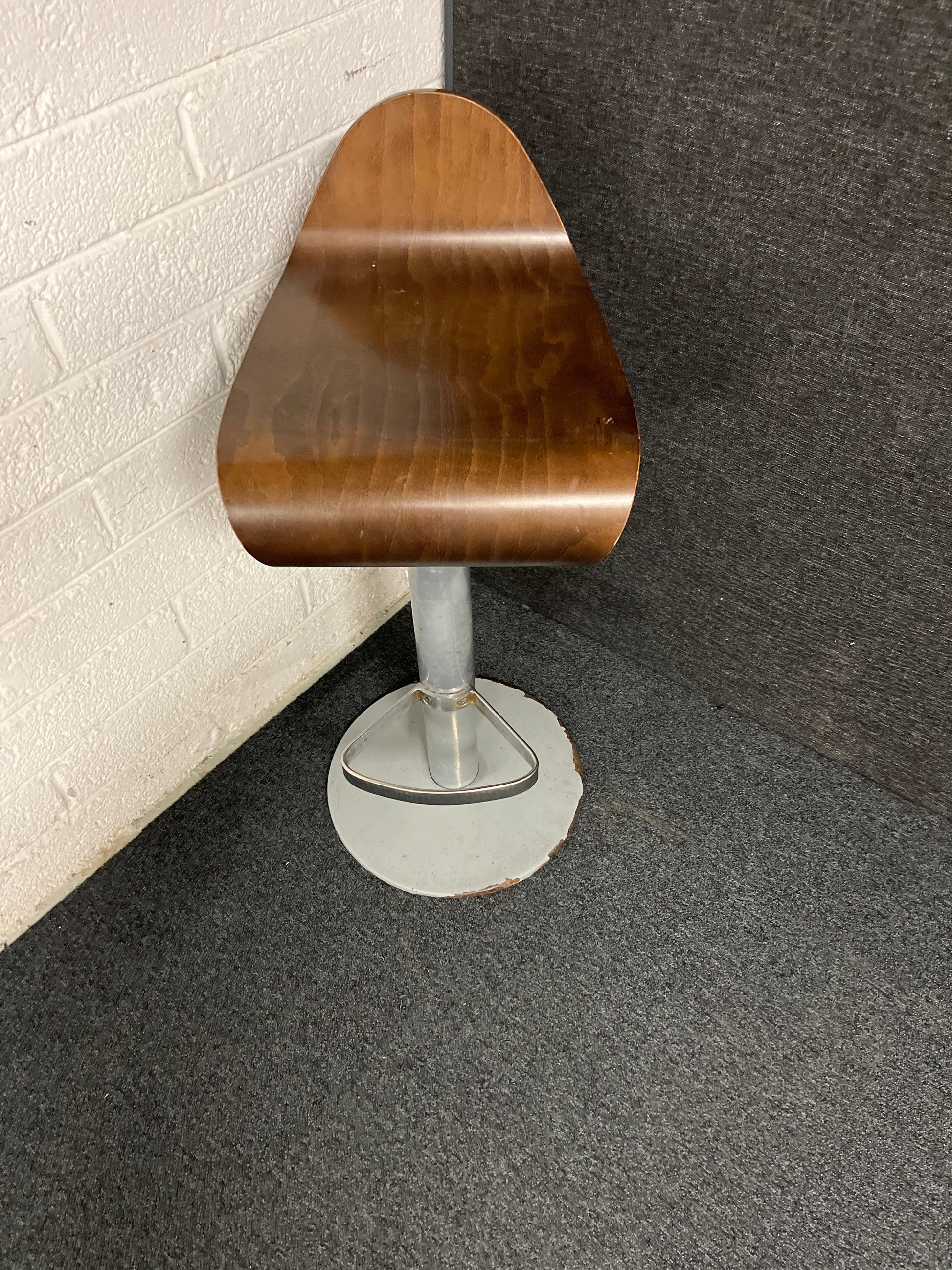 Dark stained tall plywood bar stools on metal base, swivel top 1225