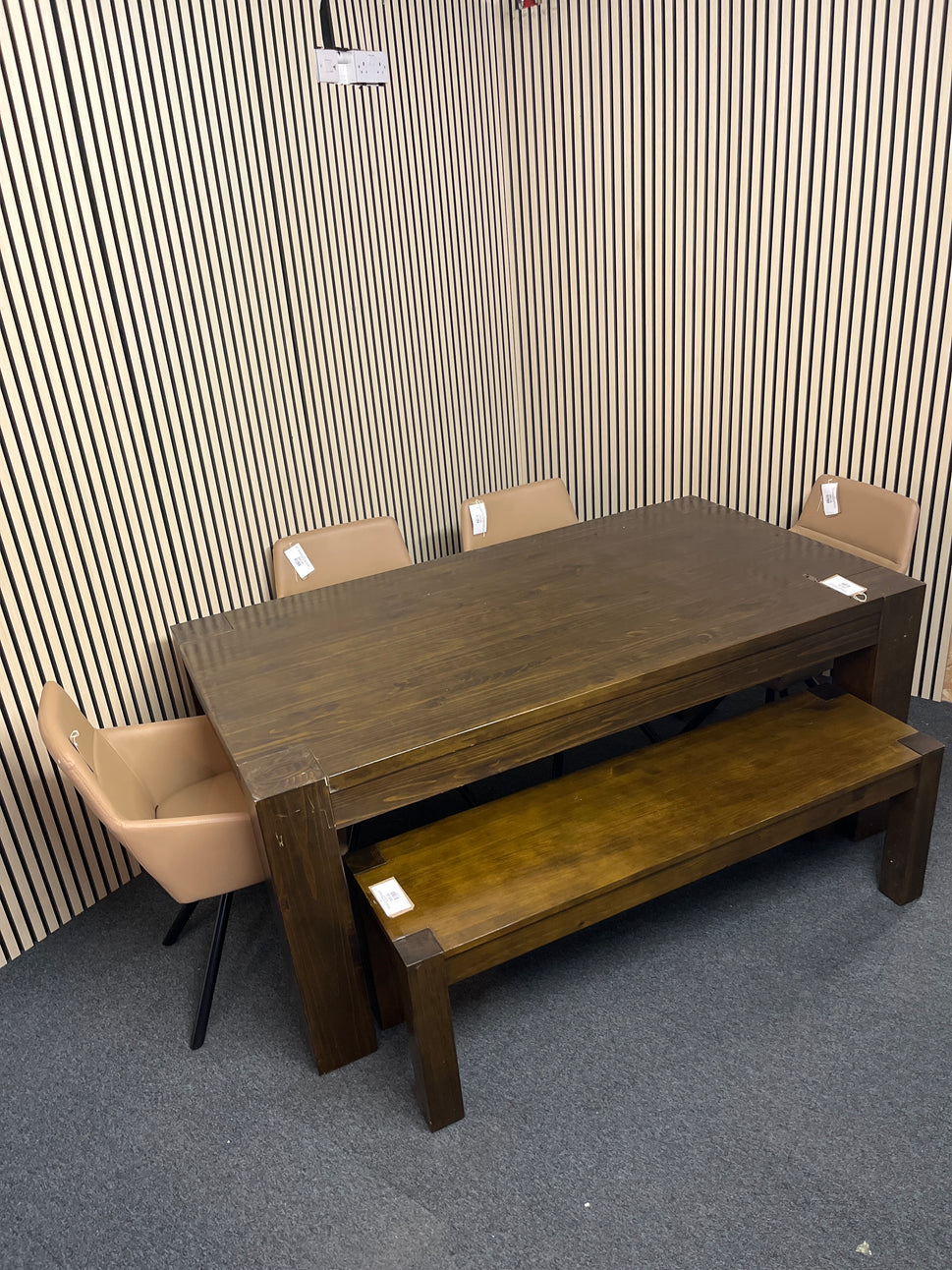 Large solid dark wood stained rectangular dining table (L180 W100 H79 cm) with matching bench and 4 no. tripod base salmon leather seats 1325