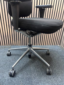 Vitra Headline high back Executive office swivel chair with integrated headrest and adjustable Lumbar support, polished chrome frame and heigh adjustable arms on a polished chrome 5 star base
