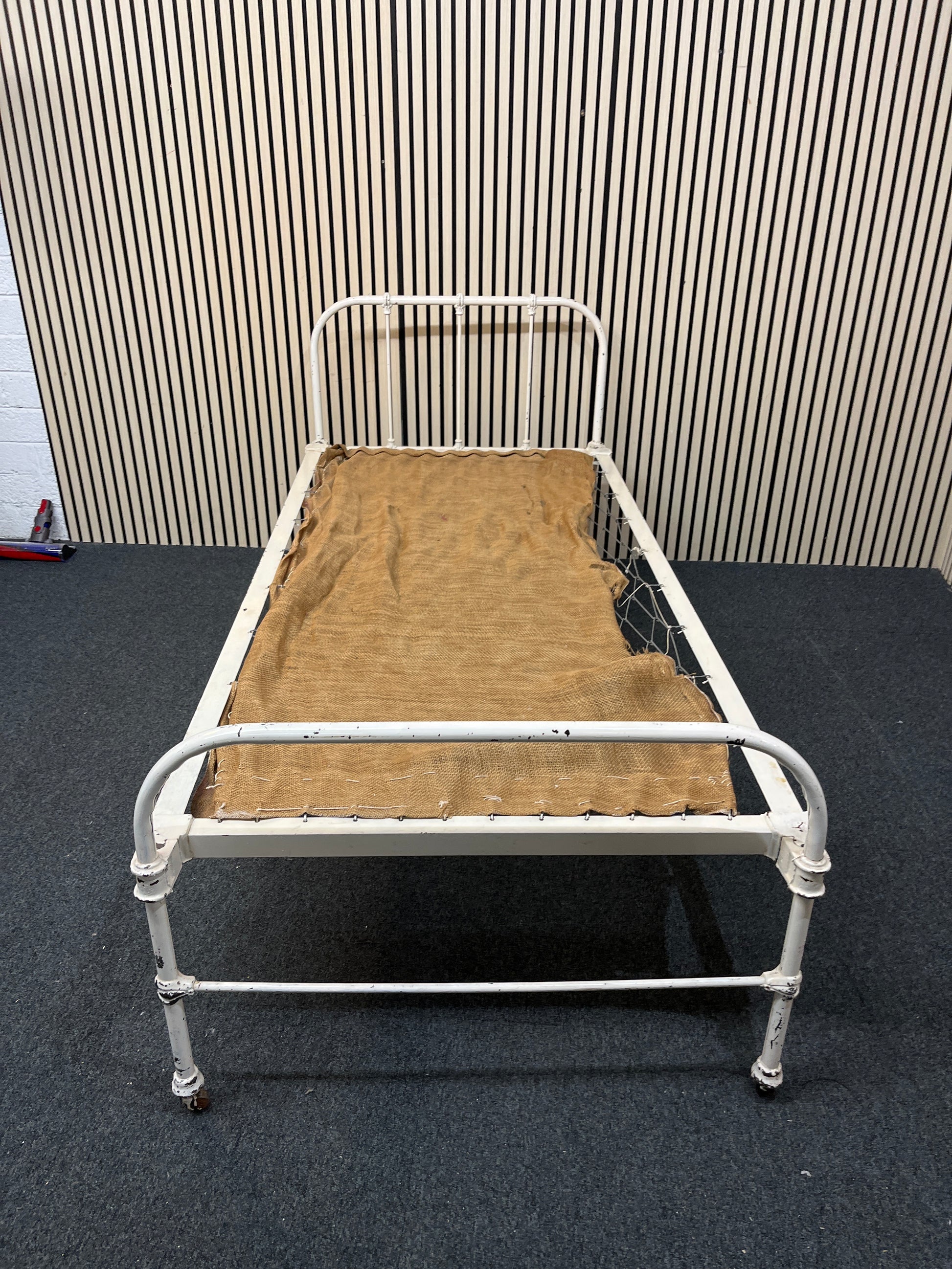 Antique white metal day bed on castors 1126