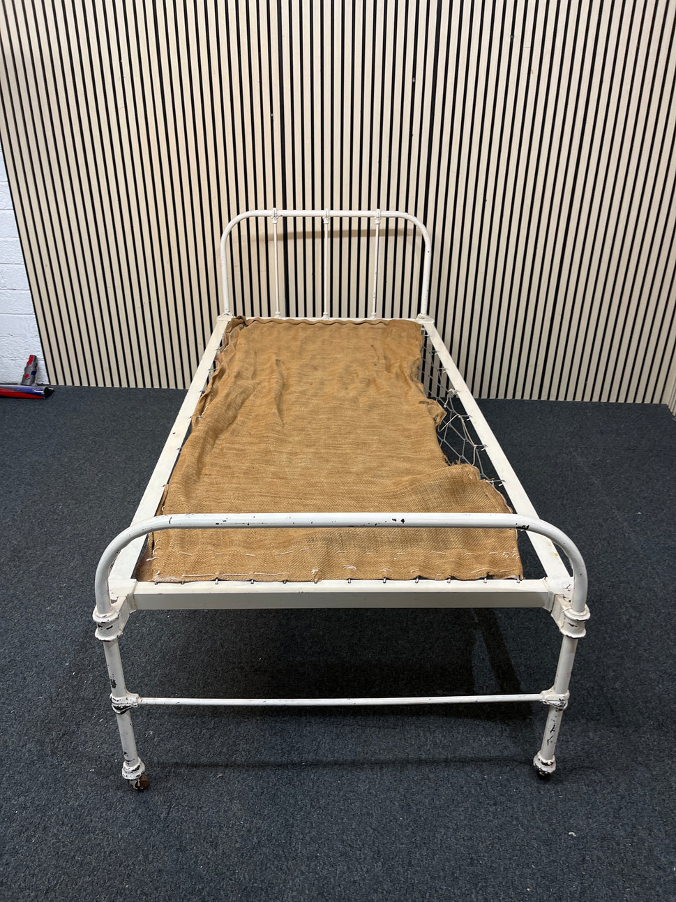 Antique white metal day bed on castors 1126