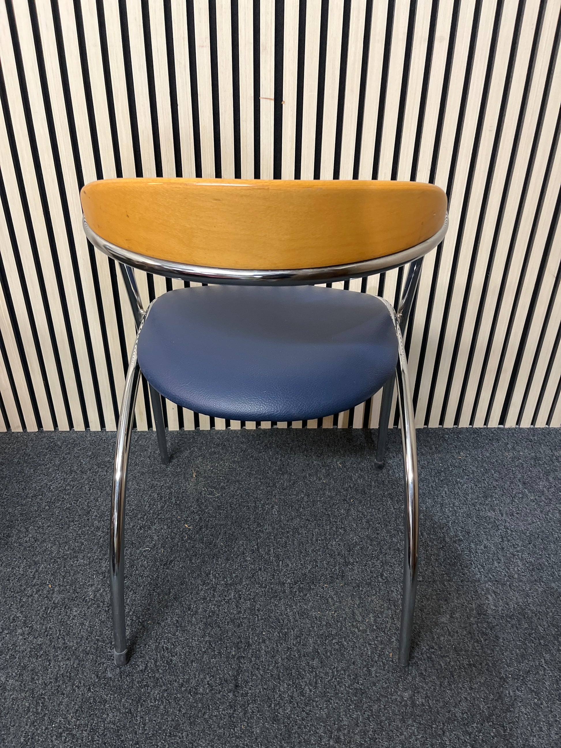 Chrome framed, beech curved back, navy vinyl seat fabric stacking chair 1425