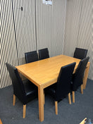 Rectangular beech dining table (L 150 x W 90 cm) with 6 black leatherette dining chairs 43505
