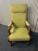 Mid-century style armchair with olive fabric and dark wood frame. 44023