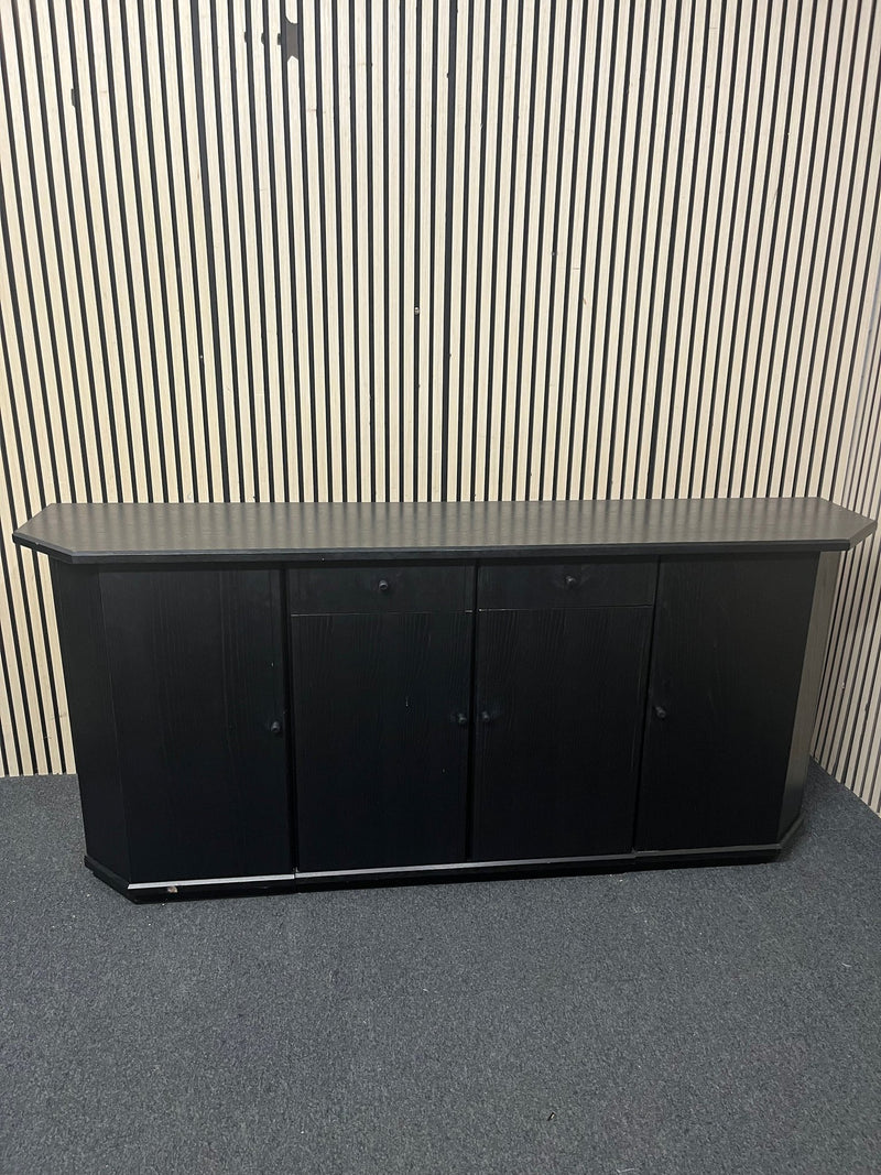 Black low sideboard with three storage doors, good condition. 44030