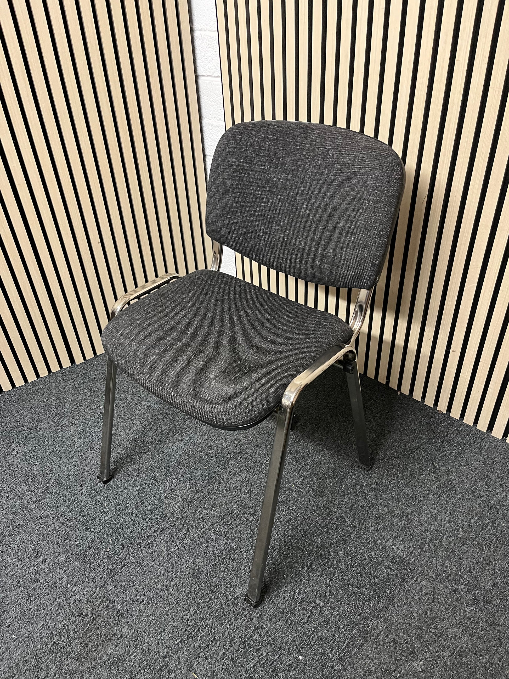 Chrome framed, charcoal fabric seat and back, stacking chair