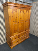 Large solid pine wardrobe featuring three doors and five drawers (207cm high 150 wide 57 deep ) 44612