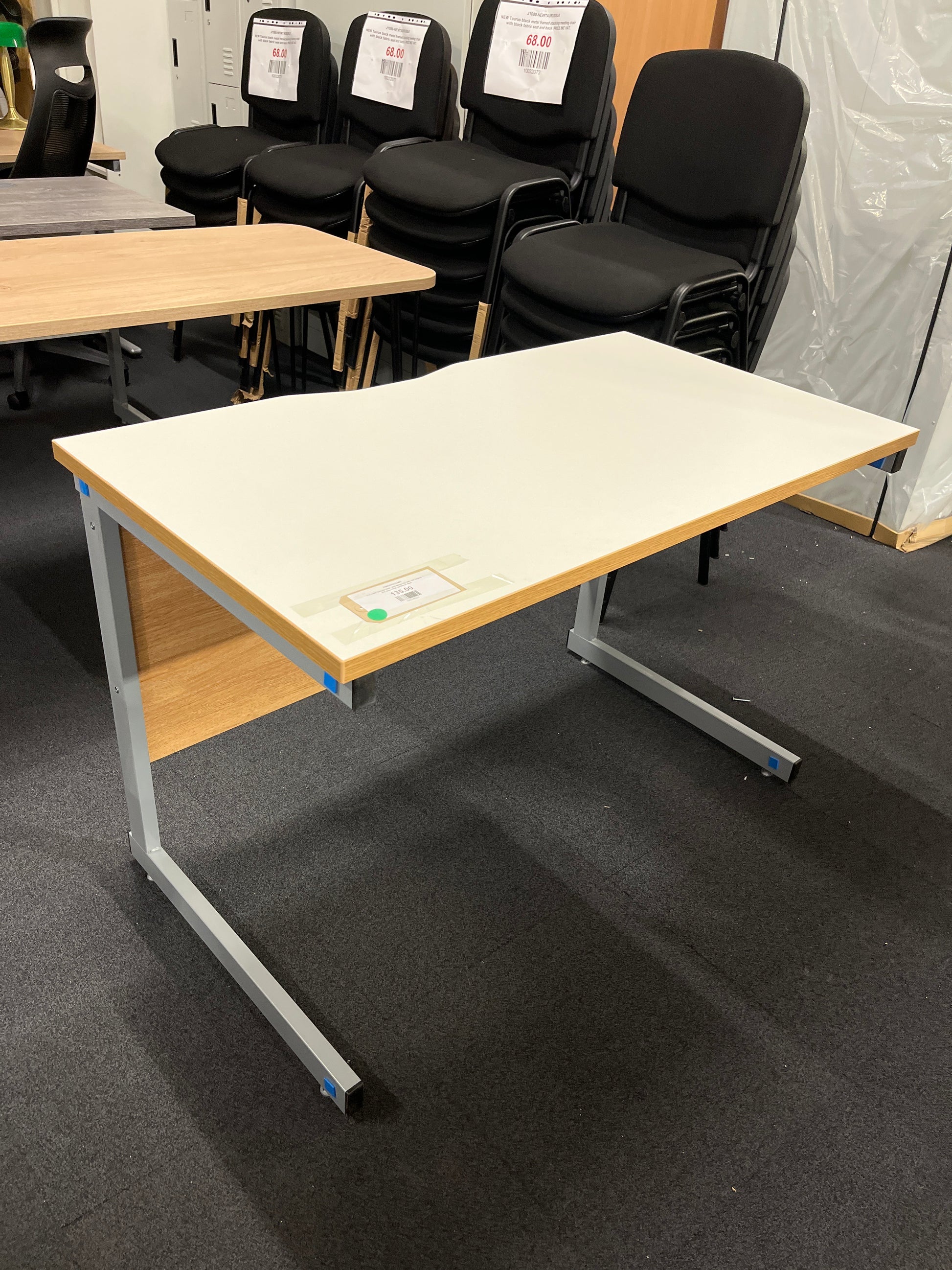 110 x 600 Straight desk with White top with oak edging and grey metal cantilever desk