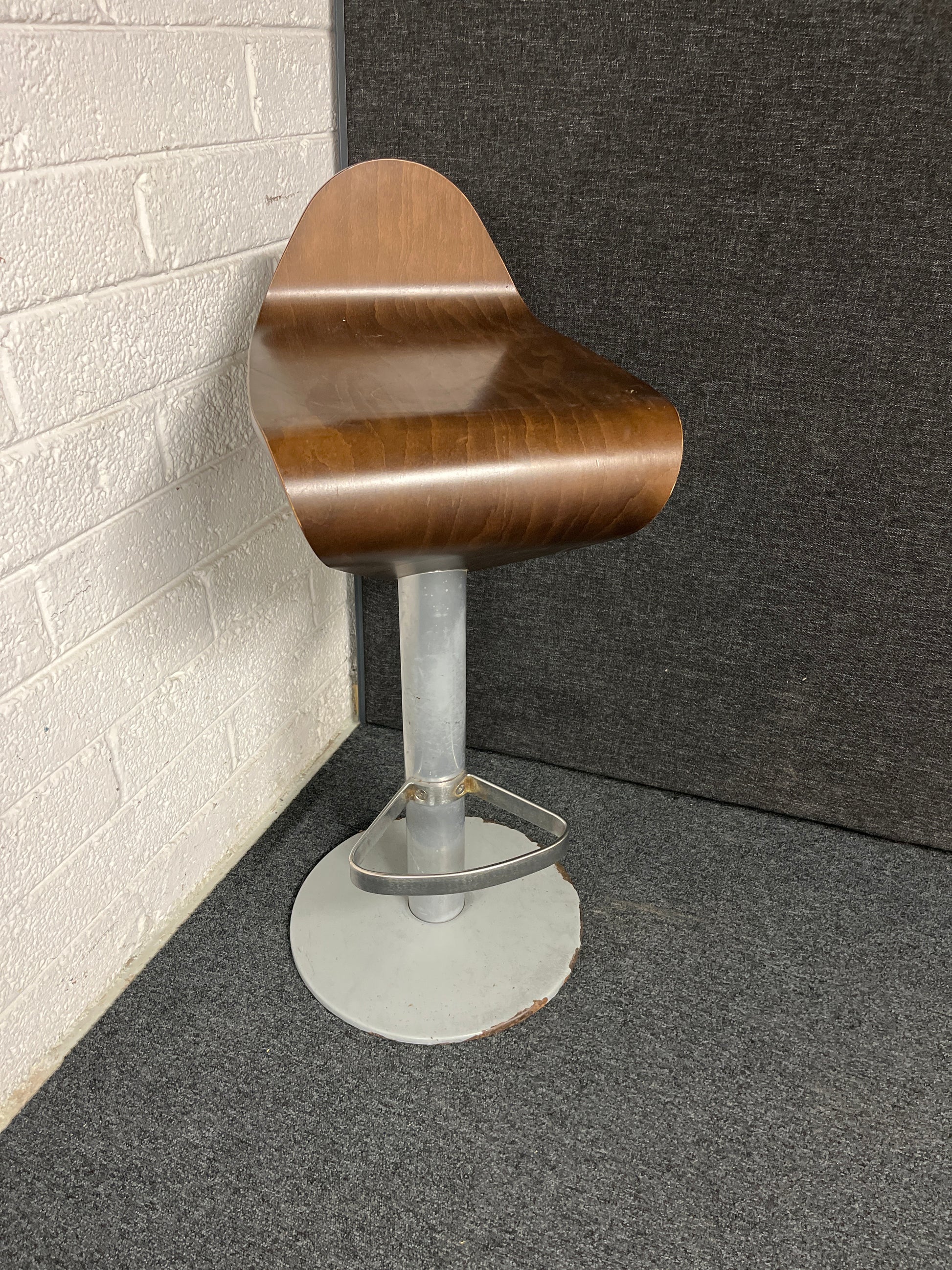 Dark stained tall plywood bar stools on metal base, swivel top 1225