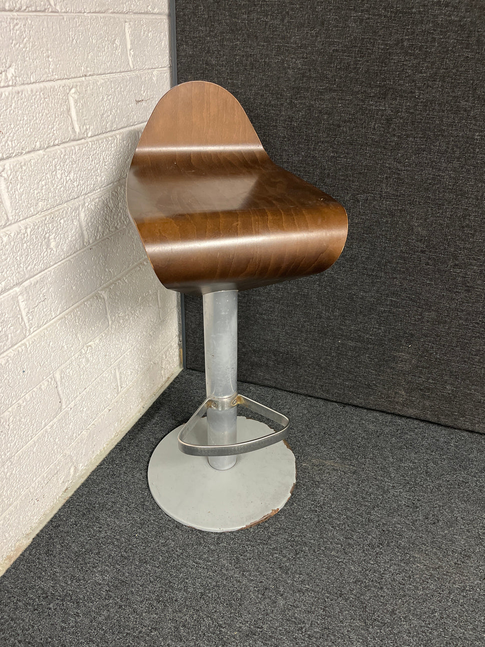 Dark stained tall plywood bar stools on metal base, swivel top 1225