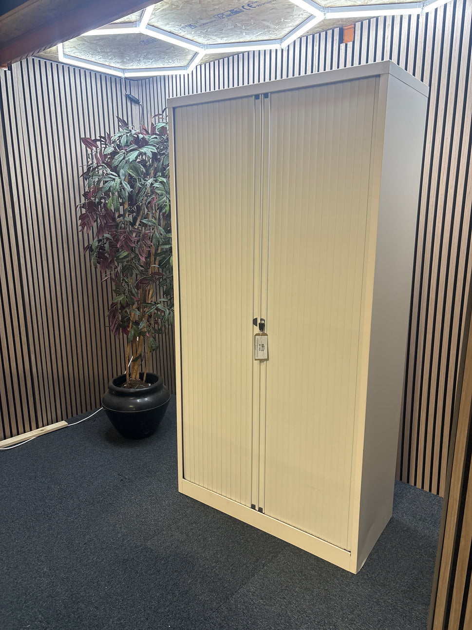 Tall 2 door side opening metal tamboutr unit in white with internal shelves and key. 179Hx470Dx100W. Price inc VAT