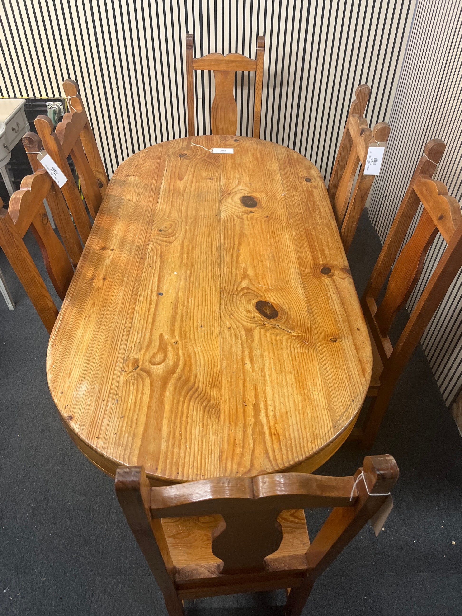 Large solid pine oval kitchen table with drawers and 6 no. high back solid wood dining chairs (W 200 cm) 43385