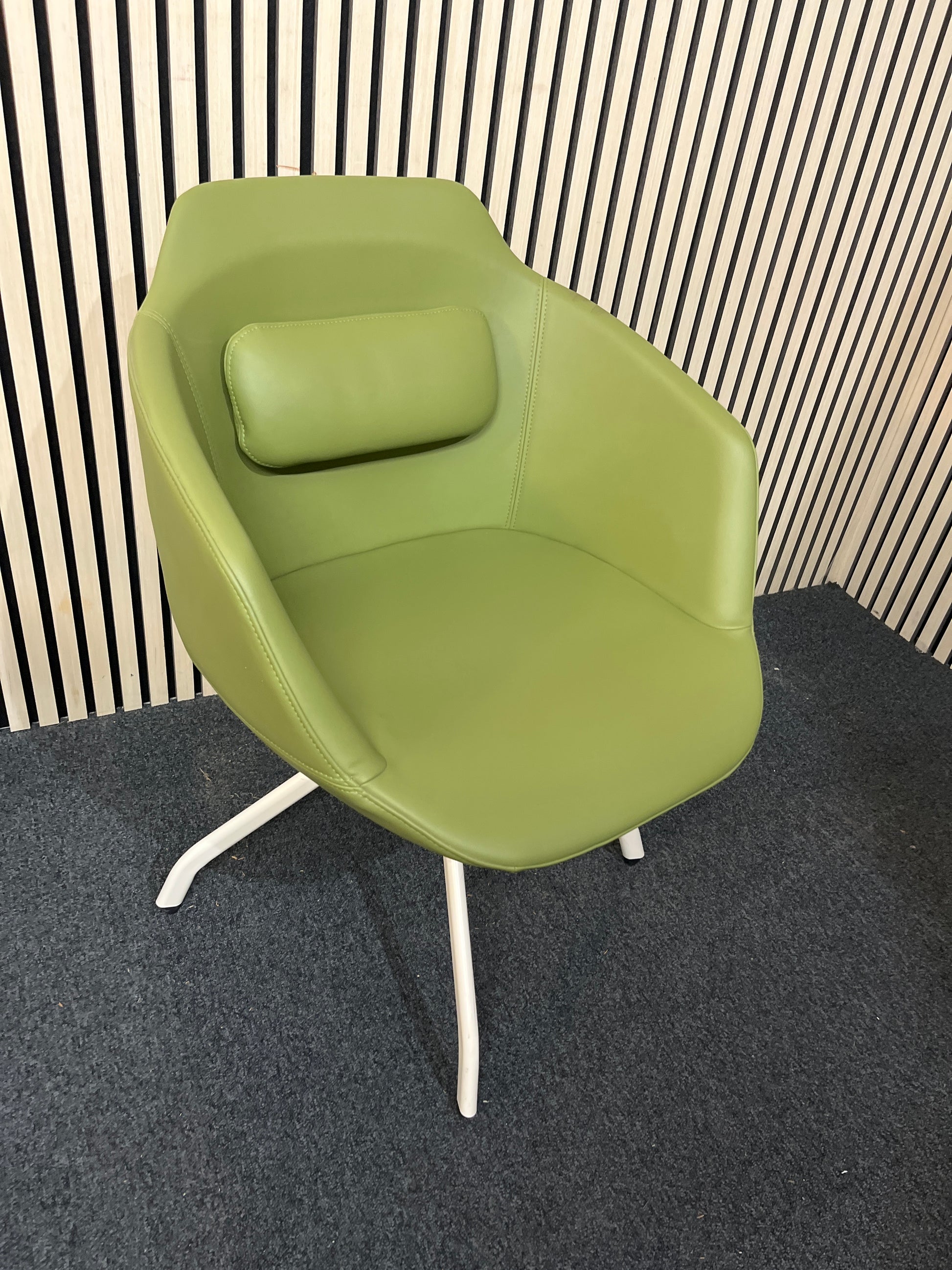 Olive green leatherette reception club chair with padded cushion and white spider swivel base 1425