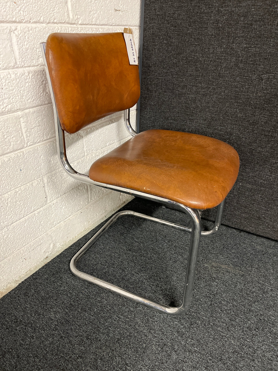 SECONDHAND BROWN leatherette cantilever meeting chair