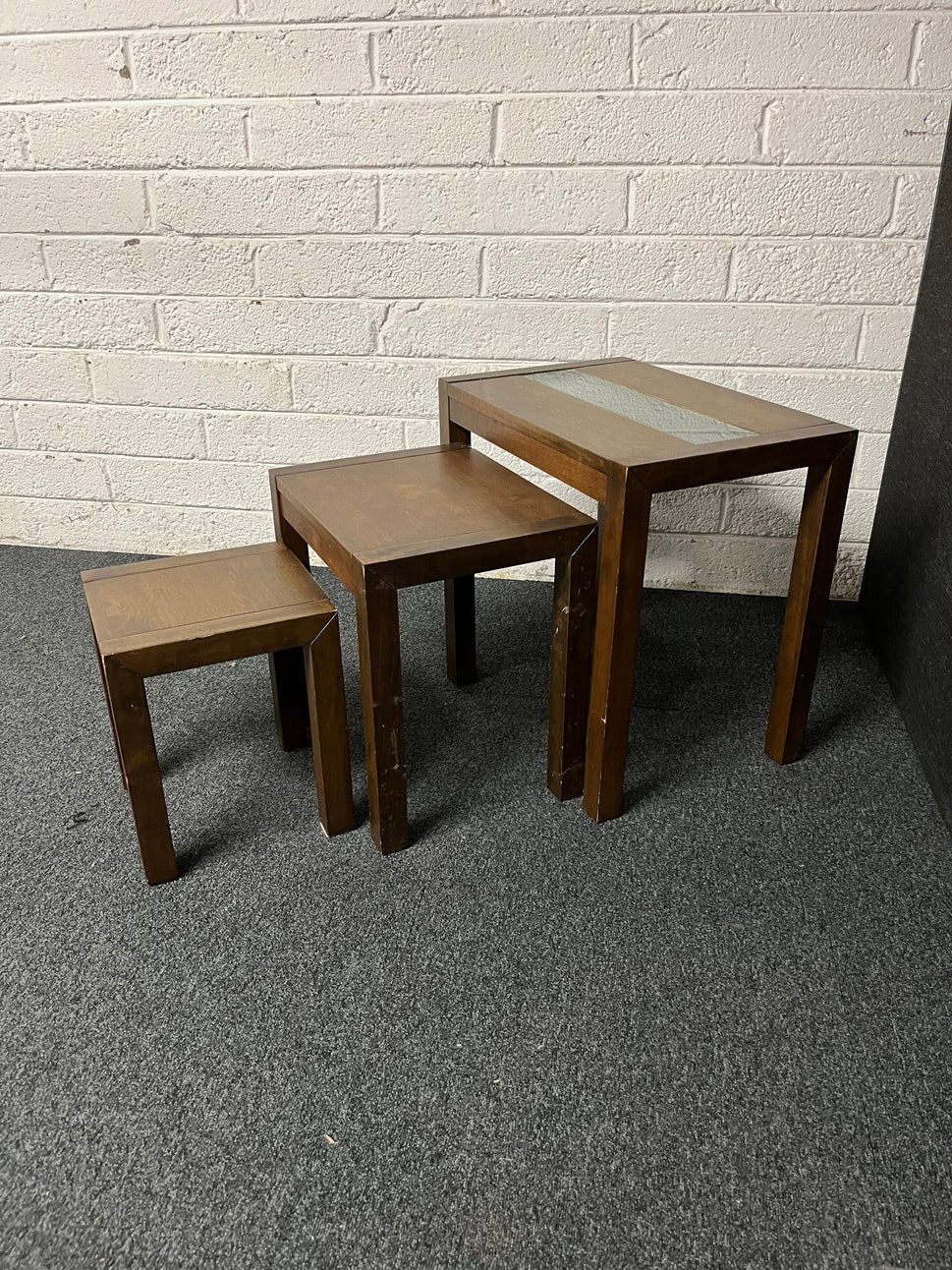Dark wood stained solid wood nest of 3 tables with glass strip 1225
