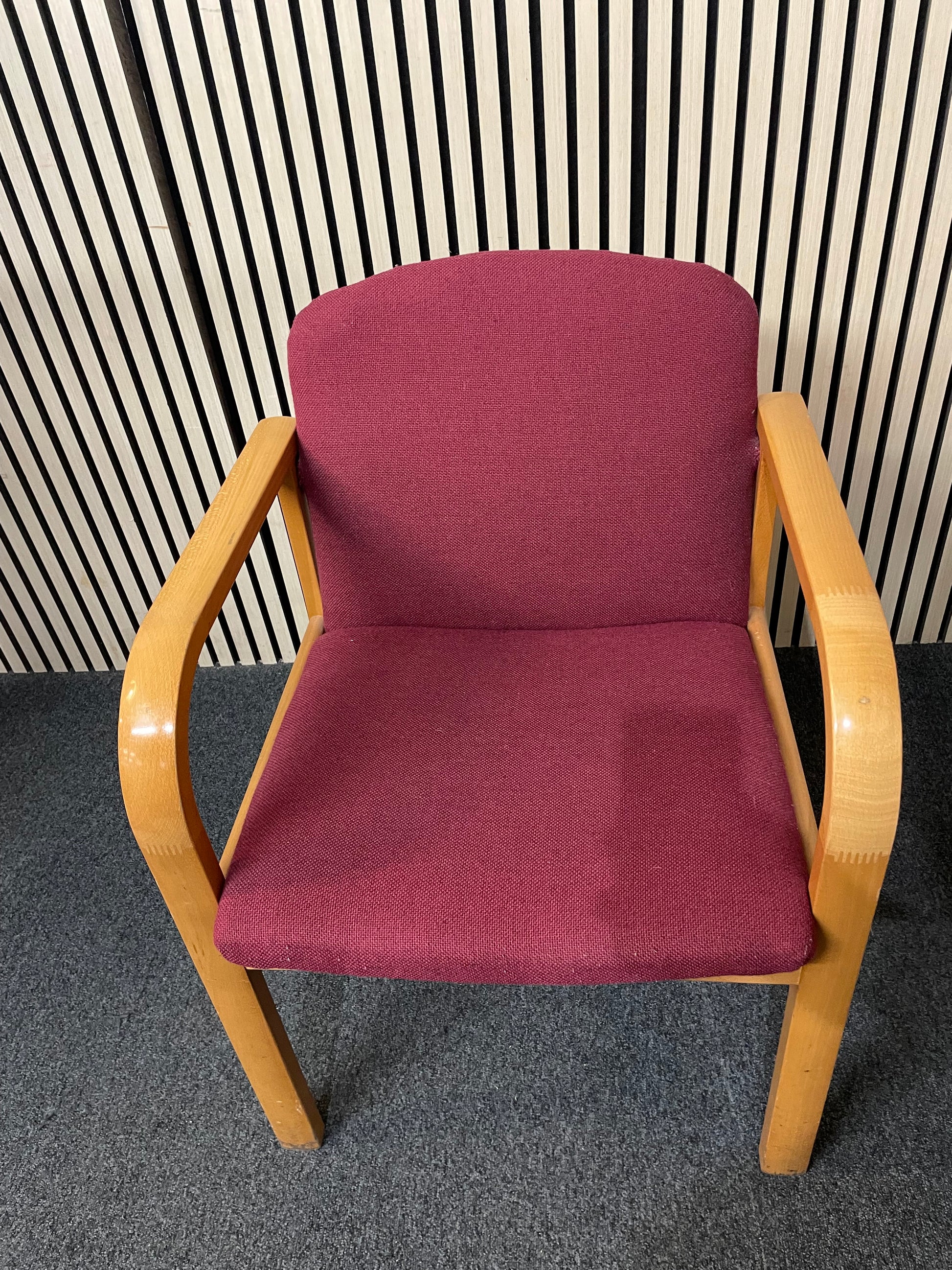 Solid beech framed meeting chair with arms in wine fabric seat and back