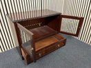 Dark wood TV unit with leaded glass doors and drawers. 44509