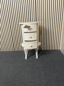 Oval three-drawer bedside locker with cabriole legs and cream finish. 44701