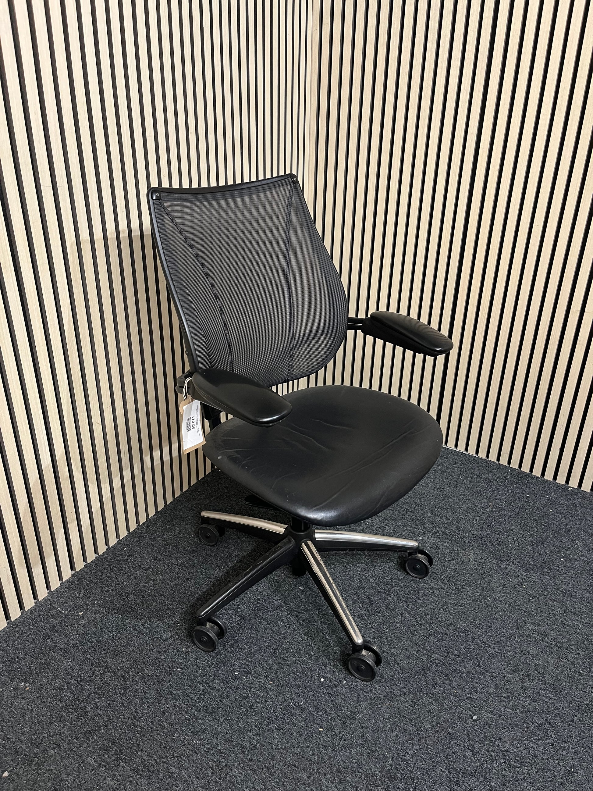 Humanscale Liberty swivel chair, mesh back with adjustable arms and black leather seat