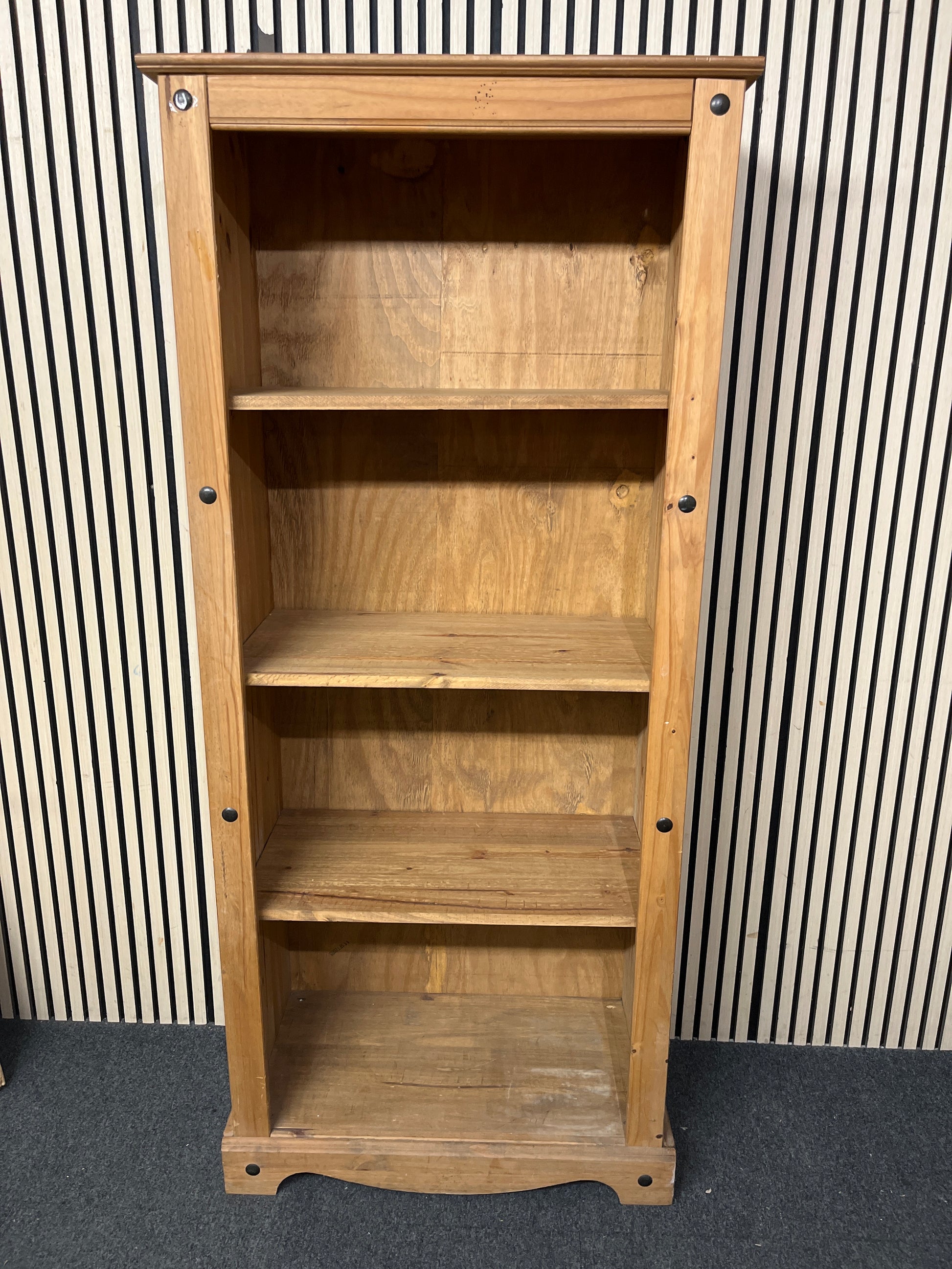 Rustic pine bookcase frame with black stud details, 184 83 43 44147