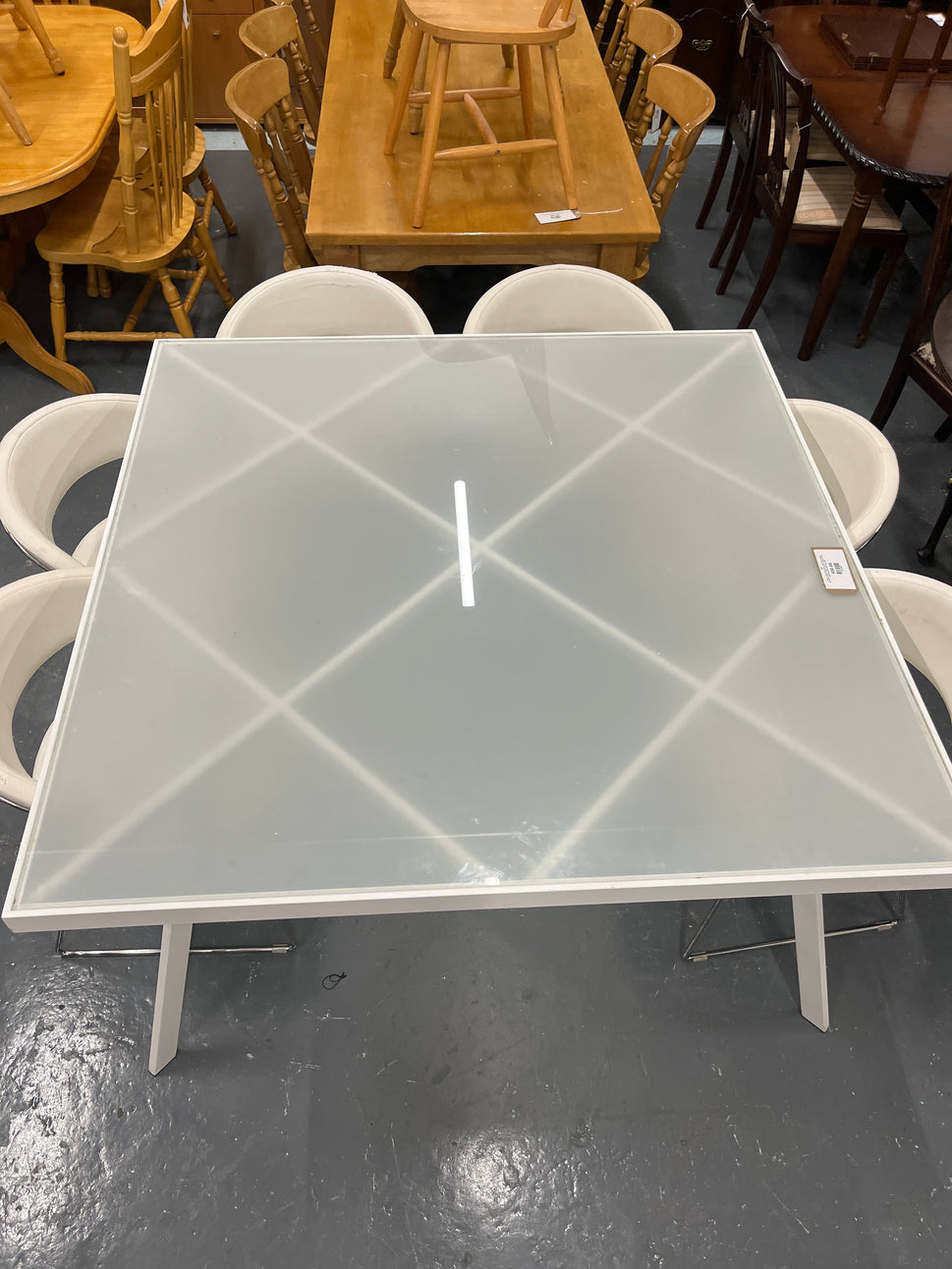 Calligaris Large white powder coated framed frosted glass table (W 140 x L 140 cm) with 6 no chrome framed, white leatherette club chairs 3225