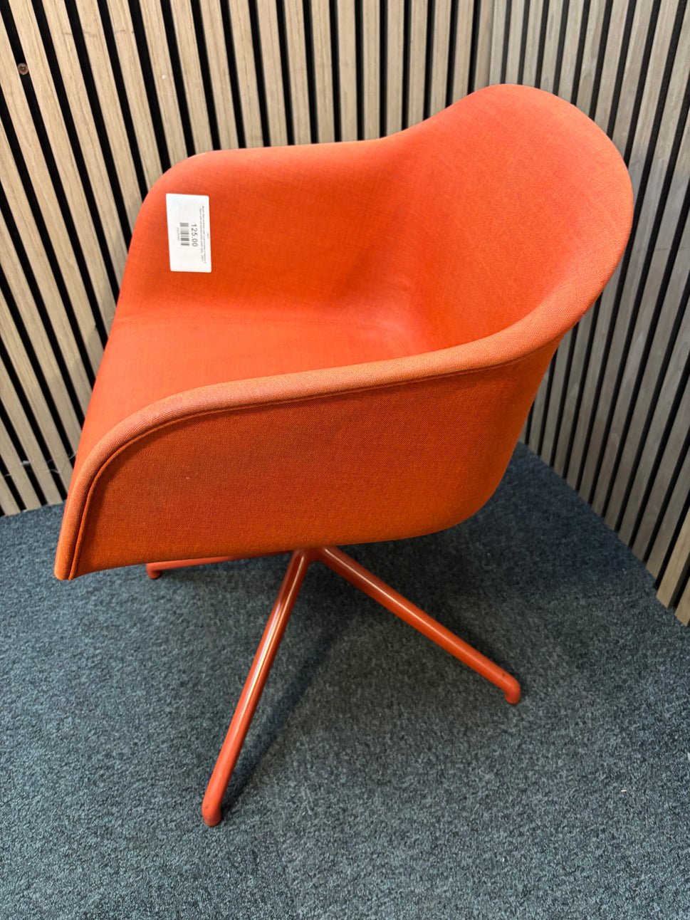 Muuto fibre armchair with a swivel base in manner 2 fabric with red painted metal spider base J3911